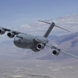 The C-17 Globemaster III T-1 flies over Owens Valley, Calif., for a test sortie. Edwards welcomed home the aircraft after 208 days of life extension modifications in San Antonio. T-1 is the first Air Force C-17 built to perform developmental testing. The aircraft is scheduled to perform flight testing to include airdrop improvements and core-computer replacement testing. (Air Force photo)