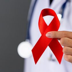 Červená stužka - symbol boja proti AIDS