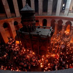 Christian pilgrims hold candles at the Church of the Holy Sepulcher, traditionally believed to be the site of the crucifixion of Jesus Christ, during the ceremony of the Holy Fire in Jerusalem's Old City, Saturday, April 18, 2009. The Holy Fire ceremony is part of Orthodox Easter rituals and the flame symbolizes the resurrection of Christ. The ceremony dates back to the 12th century. (AP Photo/Tara Todras-Whitehill) =@=,Image: 677460612, License: Rights-managed, Restrictions: , Model Release: no, Credit line: ČTK / AP / TARA TODRAS-WHITEHILL
