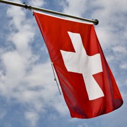 Vlajka Švajčiarska. Ilustračná snímka